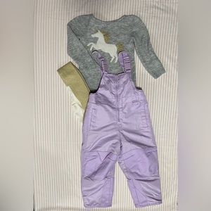 A set of overalls, sweater, tights